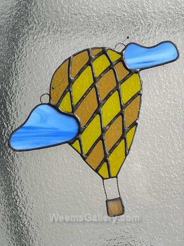 Yellow Hot air balloon with clouds by Monique Sandbeck-Moriarty